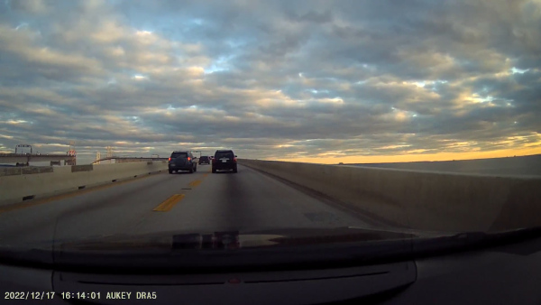 Image of roadway along the Chesapeake Bay Bridge at sunset